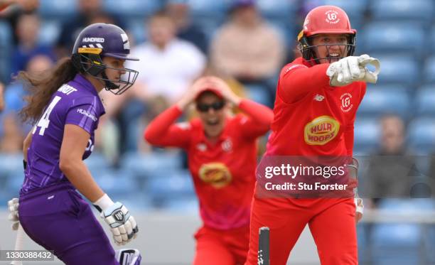 Welsh fire keeper Sarah Taylor runs out Superchargers batter Laura Wolvaardt during The Hundred match between Northern Superchargers Women and Welsh...