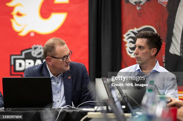 General Manager Brad Treliving and Assistant General Manager Chris Snow attend the 2021 NHL Entry Draft at Scotiabank Saddledome on July 23, 2021 in...