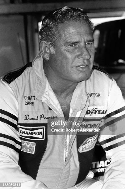 Driver David Pearson relaxes in the Daytona International Speedway garage prior to the start of the 1985 Daytona 500 on February 17, 1985 in Daytona...