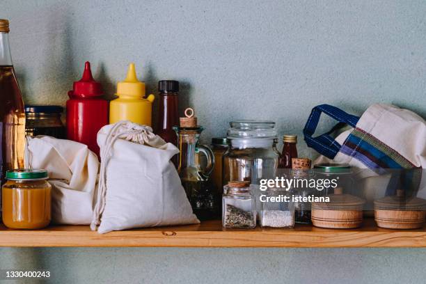 various foods in a pantry, rustic style - speisekammer stock-fotos und bilder