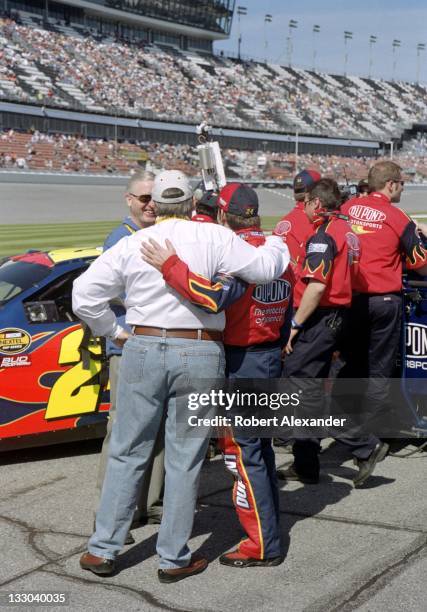 Driver Jeff Gordon talks with his car owner, Rick Hendrick, prior to the start of the 2005 Daytona 500 on February 20, 2005 at the Daytona...