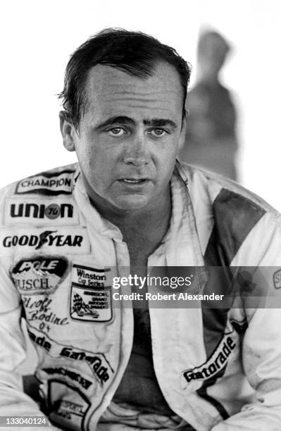 Driver Geoff Bodine cools off in the Daytona International Speedway garage after competing in the 1983 Firecracker 400 on July 4, 1983 in Daytona...