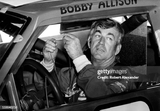 Driver Bobby Allison prepares for the start of the 1984 Daytona 500 on February 19, 1984 at the Daytona International Speedway in Daytona Beach,...