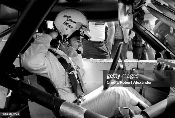 Driver Bobby Allison prepares for the start of the 1983 Firecracker 400 at the Daytona International Speedway on July 4, 1983 in Daytona Beach,...