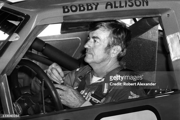 Driver Bobby Allison prepares for the start of the 1984 Daytona 500 on February 19, 1984 at the Daytona International Speedway in Daytona Beach,...