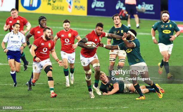 Courtney Lawes of British & Irish Lions hands off Siya Kolisi of South Africa during the 1st Test between South Africa & British & Irish Lions at...