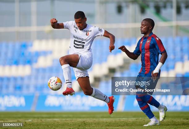 Mickael Malsa of Levante UD competes for the ball with Andy Diouf of Stade Rennais during a Pre-Season friendly match between Levante UD and Stade...