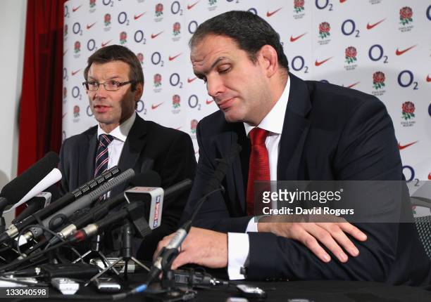 Martin Johnson, the England manager, announces his resignation as he faces the media watched by RFU director of Elite Rugby Rob Andrew on November...