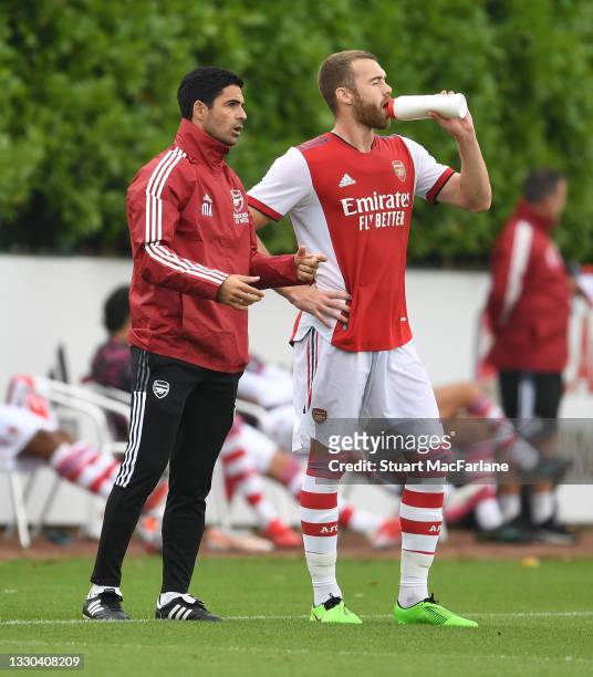 Arsenal manager Mikel Arteta and defender Calum Chambers during a pre season friendly between Arsenal and Millwall at London Colney on July 24, 2021...