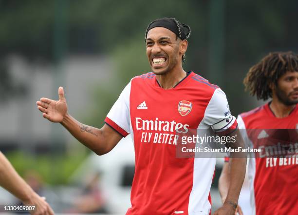 Pierre-Emerick Aubameyang celebrates the 1st Arsenal goal, scored by Calum Chambers during a pre season friendly between Arsenal and Millwall at...