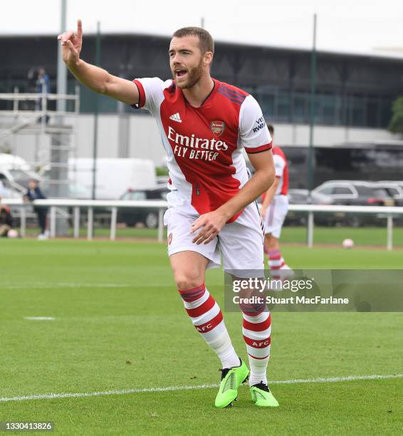 Calum Chambers celebrates scoring the 1st Arsenal goal during a pre season friendly between Arsenal and Millwall at London Colney on July 24, 2021 in...