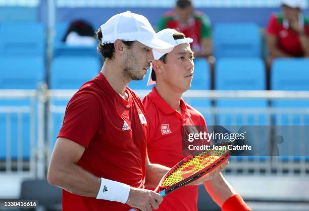 Kei Nishikori and Ben McLachlan of Japan during day one of the Tokyo 2020 Olympic Games at Ariake Tennis Park on July 24, 2021 in Tokyo, Japan.