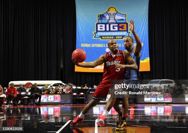 Jarrett Jack of Trilogy drives to the basket against Jannero Pargo of Triplets during week three of the BIG3 at the Orleans Arena on July 24, 2021 in...