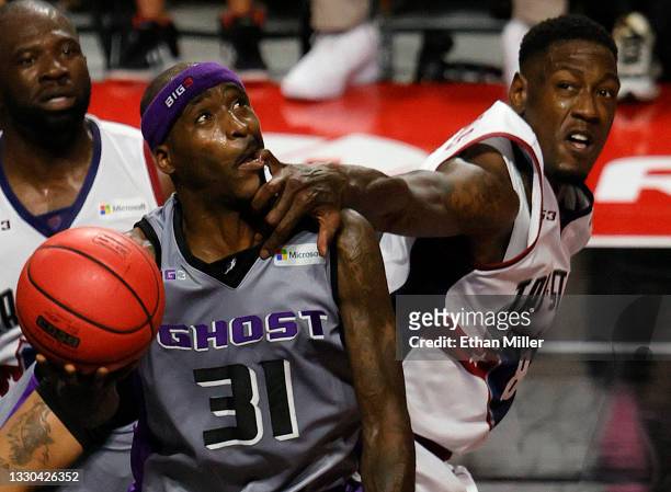 Larry Sanders of Tri-State fouls Ricky Davis of Ghost Ballers during week three of the BIG3 at the Orleans Arena on July 24, 2021 in Las Vegas,...