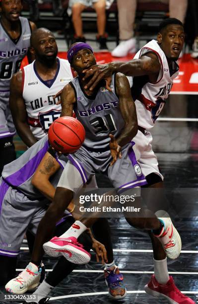 Larry Sanders of Tri-State fouls Ricky Davis of Ghost Ballers during week three of the BIG3 at the Orleans Arena on July 24, 2021 in Las Vegas,...