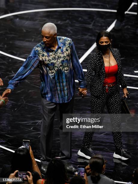 Head coach Julius "Dr. J" Erving of Tri-State and his wife Dorys Erving leave the court after a game against Ghost Ballers during week three of the...