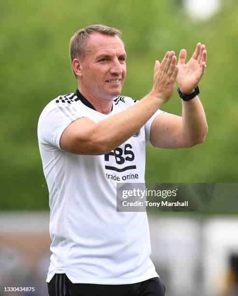 Leicester City Manager Brendan Rodgers applauds the fans at the end of the Pre-Season Friendly match between Burton Albion and Leicester City at...