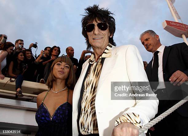 Ronnie Wood and Ana Araujo attend the Cavalli Boutique Opening during the 64th Annual Cannes Film Festival on May 18, 2011 in Cannes, France.