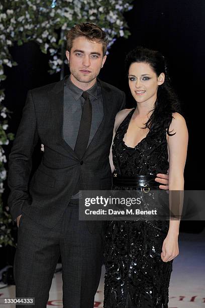 Actors Robert Pattinson and Kristen Stewart attend the UK Premiere of 'The Twilight Saga: Breaking Dawn Part 1' at Westfield Stratford City on...