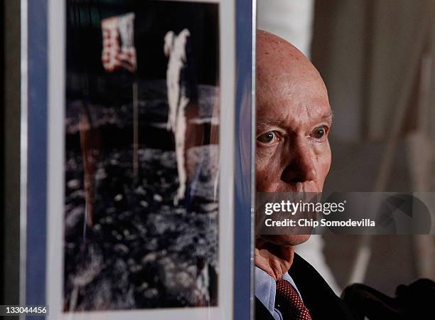 Apollo Astronaut Michael Collins listens to remarks before receiving the Congressional Gold Medal during a ceremony in the Rotunda of the U.S....