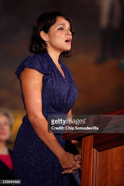 Musical artist Norah Jones sings "America the Beautiful" during the Congressional Gold Medal ceremony in the Rotunda of the U.S. Capitol November 16,...