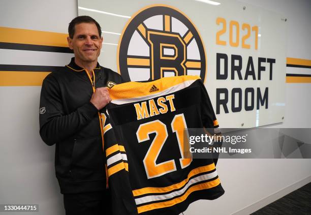 General Manager Don Sweeney of the Boston Bruins holds the jersey of the Bruins' sixth round pick Ryan Mast, 181st overall, in the 2021 NHL Entry...