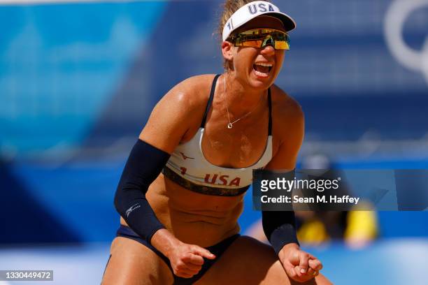April Ross of Team United States reacts after the play against Team China during the Women's Preliminary - Pool B on day two of the Tokyo 2020...