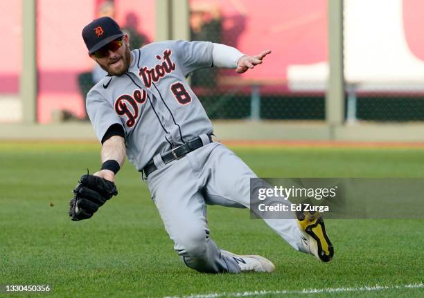 Robbie Grossman of the Detroit Tigers catches a ball hit by Salvador Perez of the Kansas City Royals in the fourth inning at Kauffman Stadium on July...