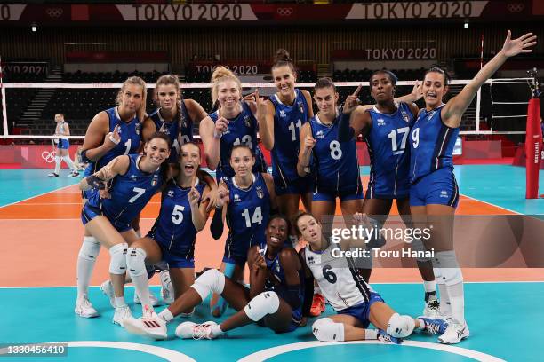 Team Italy posses for a photo after defeating Team ROC during the Women's Preliminary - Pool B on day two of the Tokyo 2020 Olympic Games at Ariake...