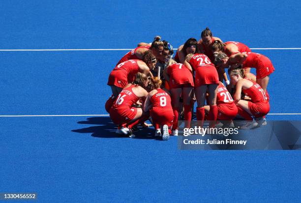 Team Great Britain huddle up prior to the Women's Pool A match against Team Germany on day two of the Tokyo 2020 Olympic Games at Oi Hockey Stadium...