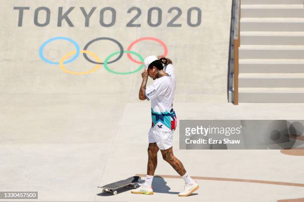 Nyjah Huston of Team USA reacts after falling at the Skateboarding Men's Street Prelims on day two of the Tokyo 2020 Olympic Games at Ariake Urban...