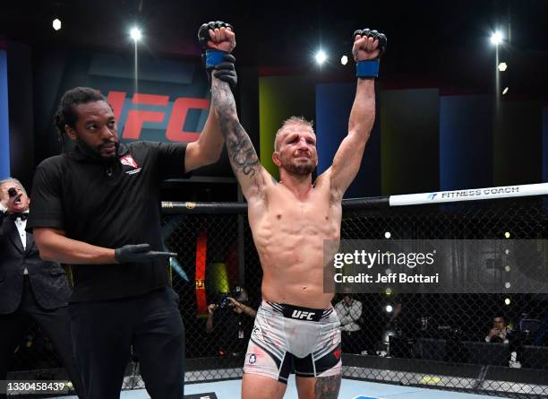 Dillashaw reacts after his split-decision victory over Corey Sandhagen in their bantamweight fight during the UFC Fight Night event at UFC APEX on...