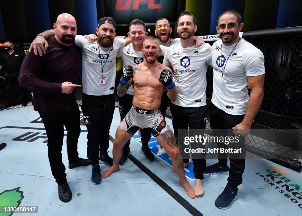 Dillashaw reacts after his split-decision victory over Corey Sandhagen in their bantamweight fight during the UFC Fight Night event at UFC APEX on...