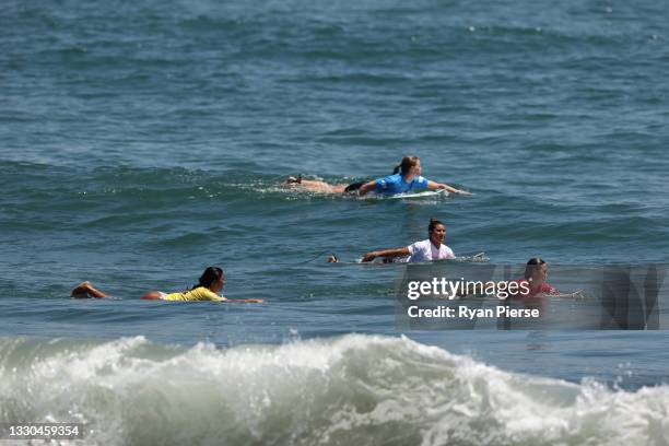 Mahina Maeda of Team Japan, Bianca Buitendag of Team South Africa, Brisa Hennessy of Team Costa Rica and Sally Fitzgibbons of Team Australia compete...