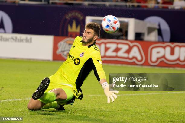 Alex Bono of Toronto FC saves the ball in the game against the Chicago Fire during the second half at Soldier Field on July 24, 2021 in Chicago,...