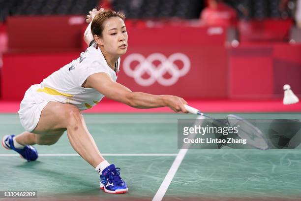 Okuhara Nozomi of Team Japan competes against Yvonne Li of Team Germany during a Women’s Singles Group E match on day two of the Tokyo 2020 Olympic...