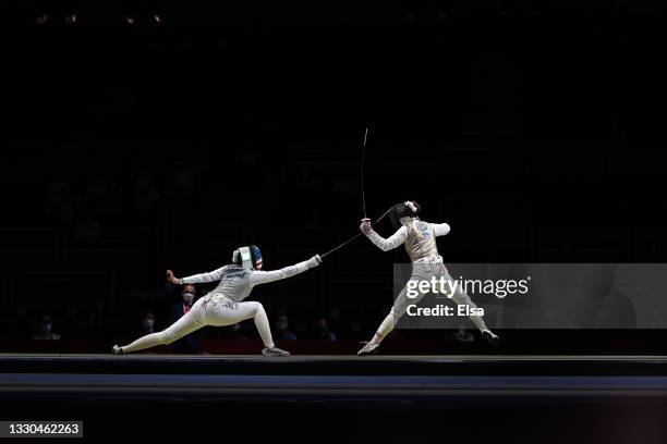 Jacqueline Dubrovich of Team United, left, States competes against Leonie Ebert of Team Germany in Women's Individual Foil first round on day two of...
