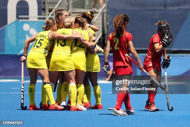 Team Australia celebrates scoring their third goal against Team Spain during the Women's Pool B match on day two of the Tokyo 2020 Olympic Games at...