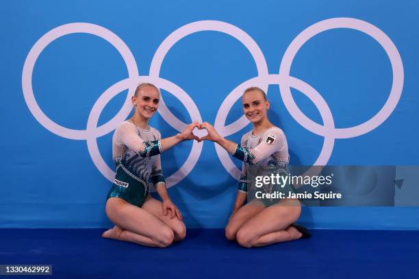 Alice D'Amato and Asia D'Amato of Team Italy pose in front of the rings during Women's Qualification on day two of the Tokyo 2020 Olympic Games at...