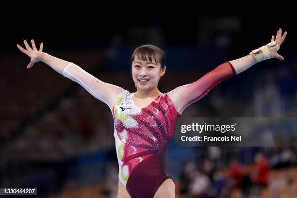 Yuna Hiraiwa of Team Japan reacts after competing on balance beam during Women's Qualification on day two of the Tokyo 2020 Olympic Games at Ariake...