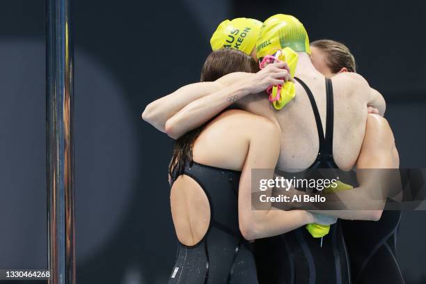 Emma McKeon, Bronte Campbell, Meg Harris and Cate Campbell of Team Australia celebrate after winning the gold medal in the Women's 4 x 100m Freestyle...