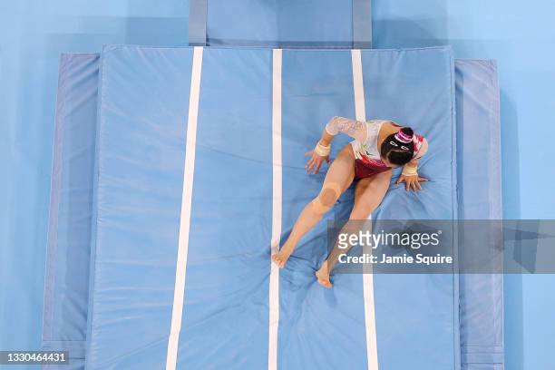 Hitomi Hatakeda of Team Japan falls as she competes on vault during Women's Qualification on day two of the Tokyo 2020 Olympic Games at Ariake...