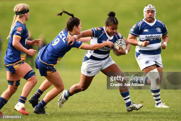 Luisa Togotogorua of Auckland attempts to evade the defence during the round two Farah Palmer Cup match between Otago and Auckland at University of...