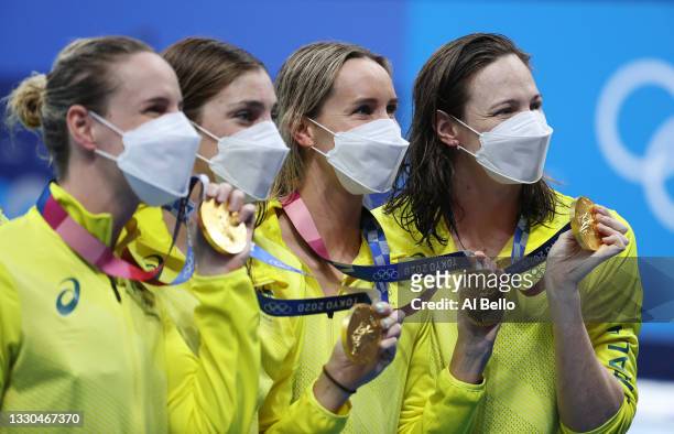 Bronte Campbell, Meg Harris, Emma Mckeon and Cate Campbell of Team Australia pose with the gold medal for the Women's 4 x 100m Freestyle Relay Final...