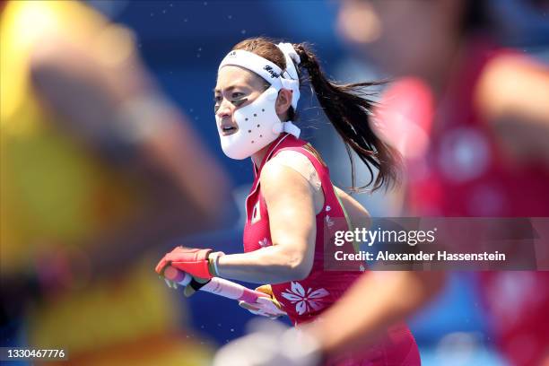 Hazuki Nagai of Team Japan runs upfield during the Women's Pool B Match against Team China on day two of the Tokyo 2020 Olympic Games at Oi Hockey...