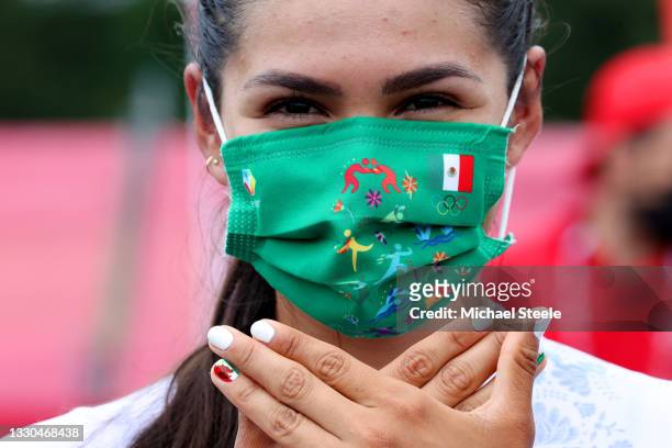 The rider Lizbeth Yareli Salazar Vazquez of Team Mexico shows her nail art prior to during the Women's road race on day two of the Tokyo 2020 Olympic...