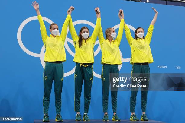 Bronte Campbell, Meg Harris, Emma Mckeon and Cate Campbell of Team Australia pose after winning the gold medal in the Women's 4 x 100m Freestyle...