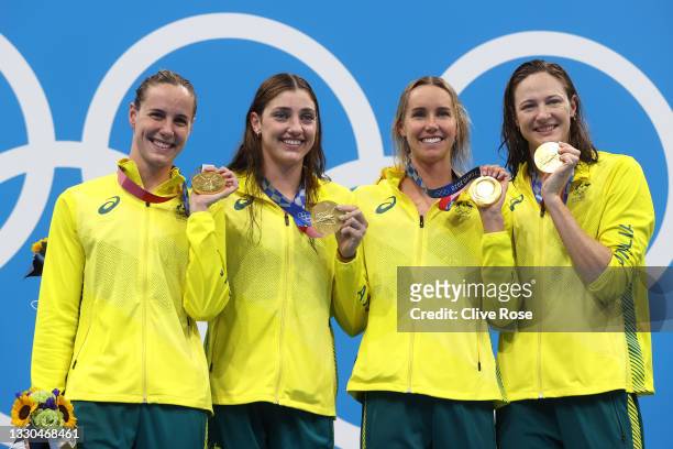 Bronte Campbell, Meg Harris, Emma Mckeon and Cate Campbell of Team Australia pose after winning the gold medal in the Women's 4 x 100m Freestyle...