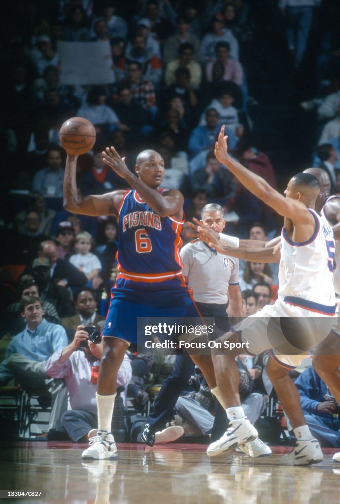 Terry Mills of the Detroit Pistons looks to pass the ball against the