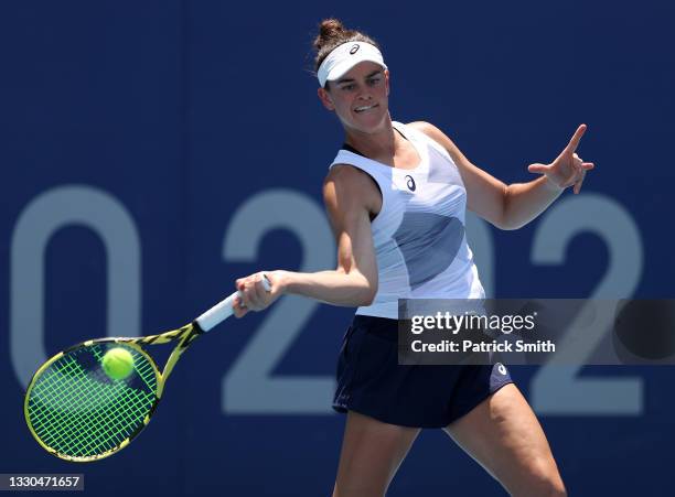 Jennifer Brady of Team USA plays a forehand during her Women's Singles First Round match against Camila Giorgi of Team Italy on day two of the Tokyo...